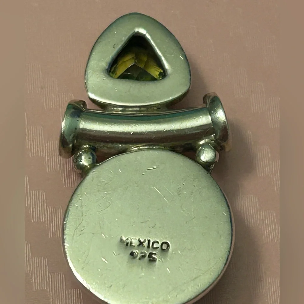 Vintage artisan made black onyx and peridot 925 silver slide pendant.